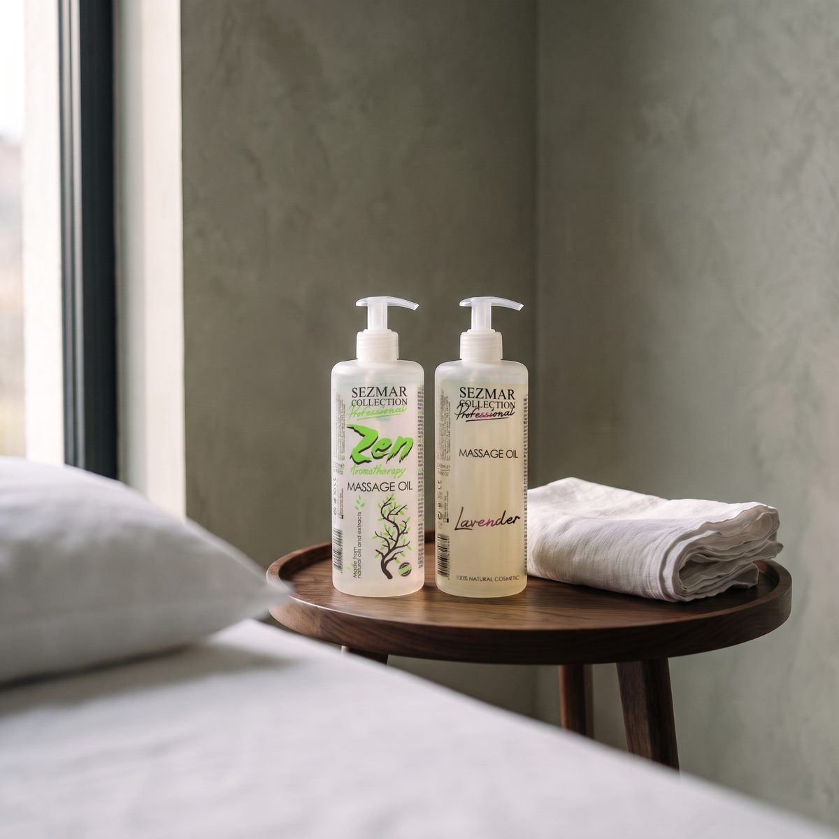 Zen and Lavender massage oils 500 ml on a side table next to a massage couch