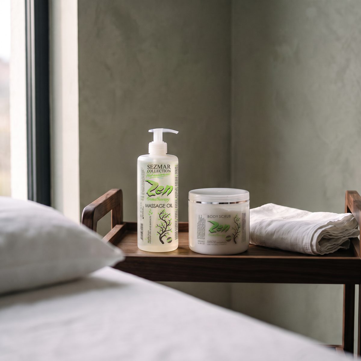 Zen Massage Oil and Zen Body Scrub 500 ml on a wooden trolley